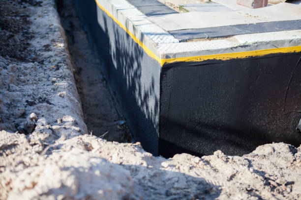 Professional Interior Drainage System technician working in Millburn, NJ